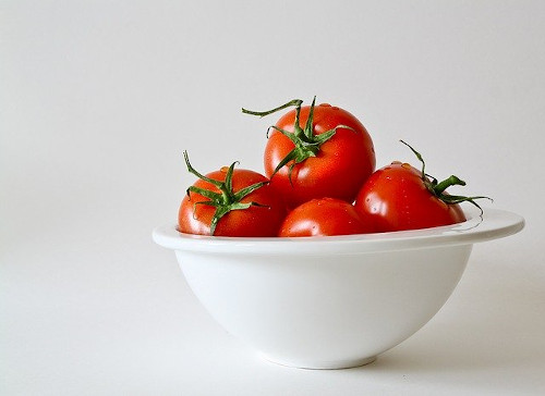 Best foods for men's reproductive health: Image of bowl of tomatoes.