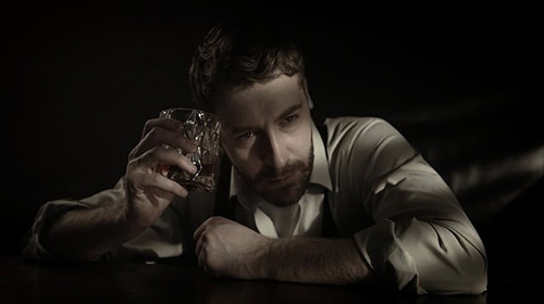 man suffering from alcoholism