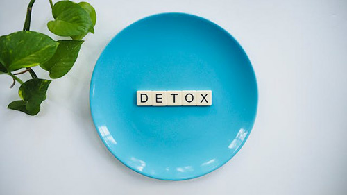 detox in letters on a plate