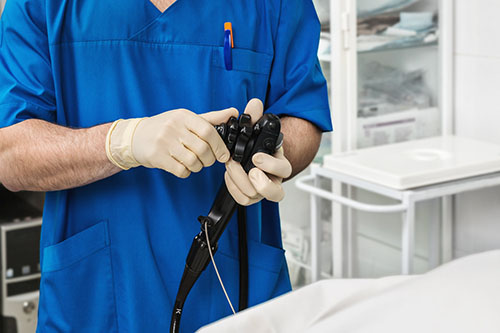 surgeon using an endoscope