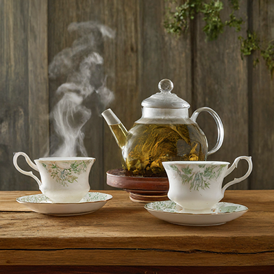 kettle and two cups of Fraxinella tea