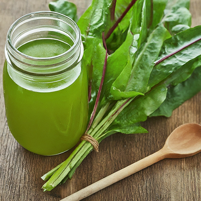 a glass jar of patience dock juice