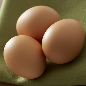 three eggs on a cloth
