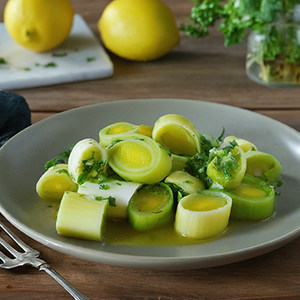 steamed leeks on a plate