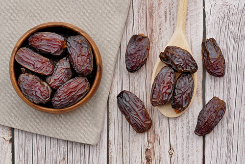 bowl of dates on a table