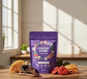 A package of Everyday Dose coffee and mushrooms on a table.